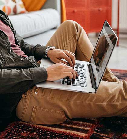 Man using laptop at home